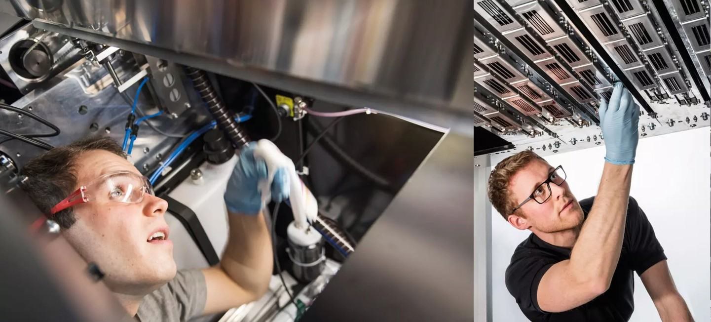 Durst service experts inspecting printing systems